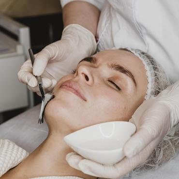 A woman having Hydra Treatment on face